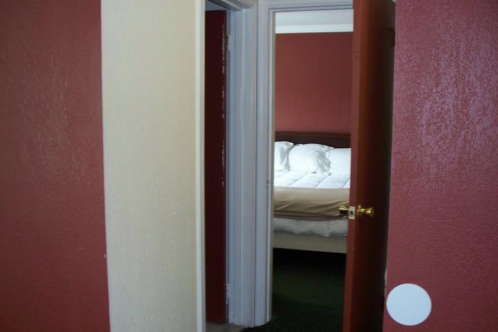 Budget Inn&Suites Wall Exterior foto