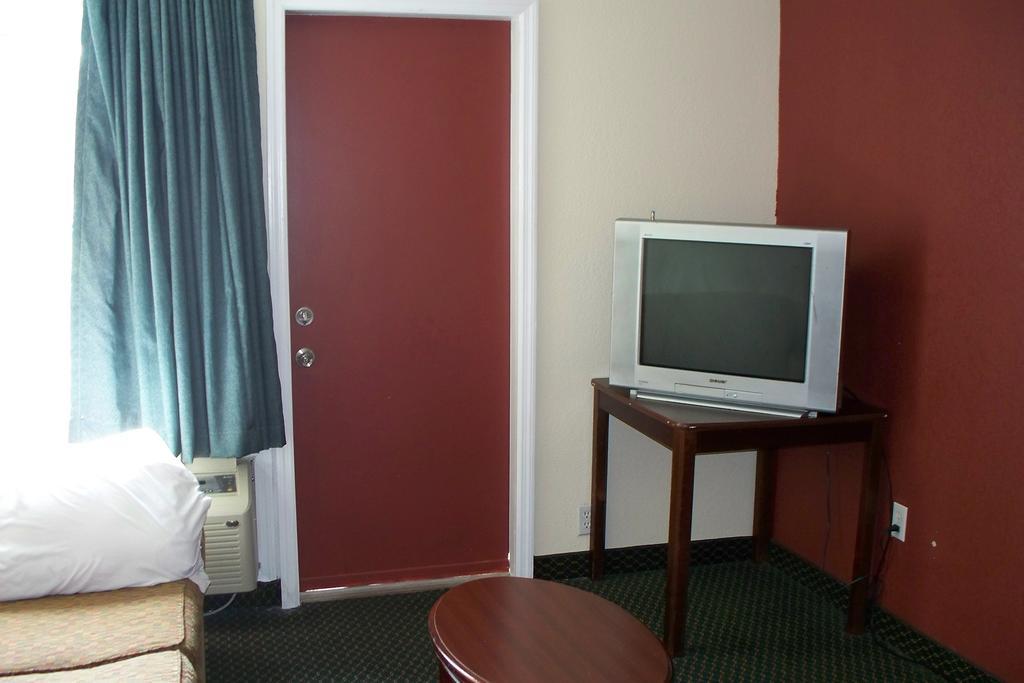 Budget Inn&Suites Wall Exterior foto