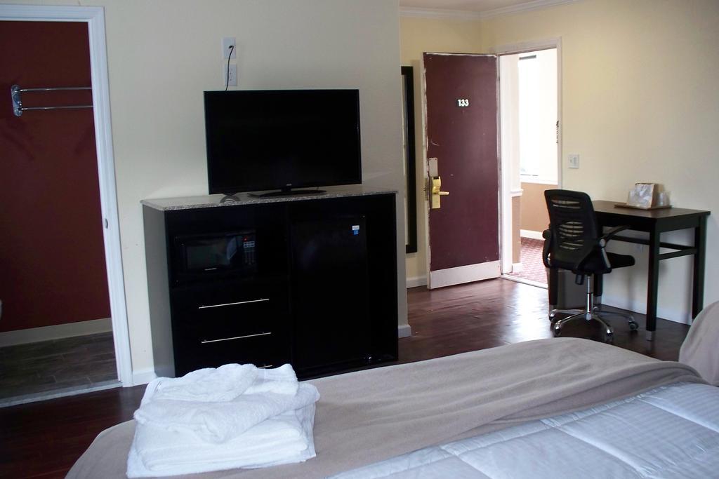 Budget Inn&Suites Wall Exterior foto